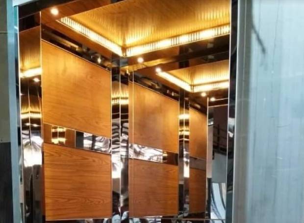 Stylish elevator interior with soft lighting